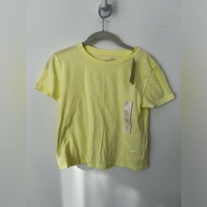 NWT. Universal Threads (Target) light neon yellow waist length tee. Size XS.